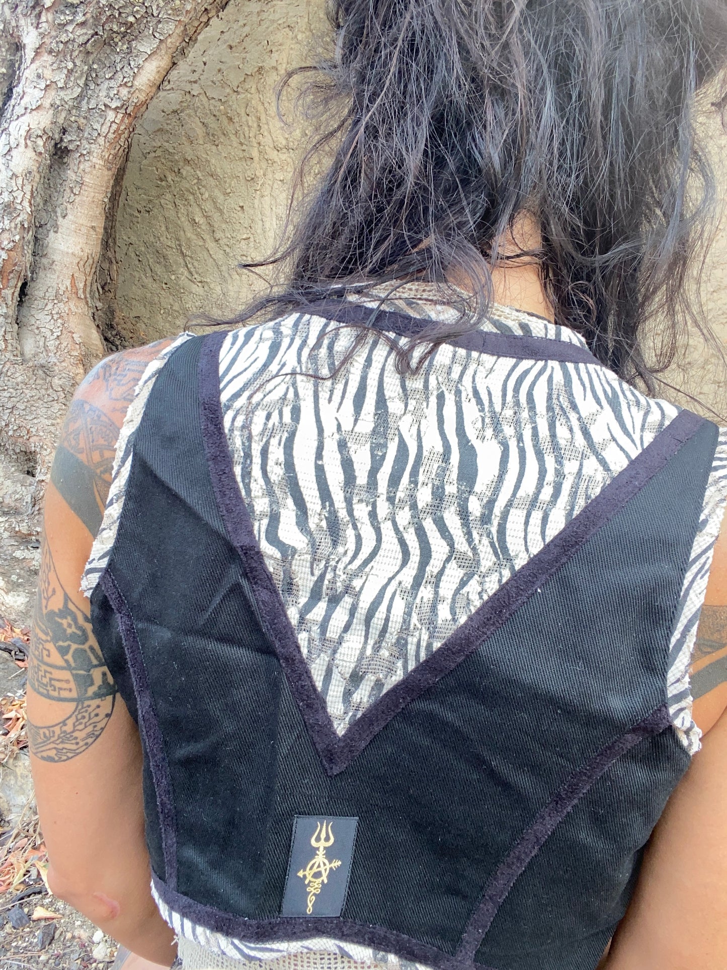 Short vest with tiger and fake leather details